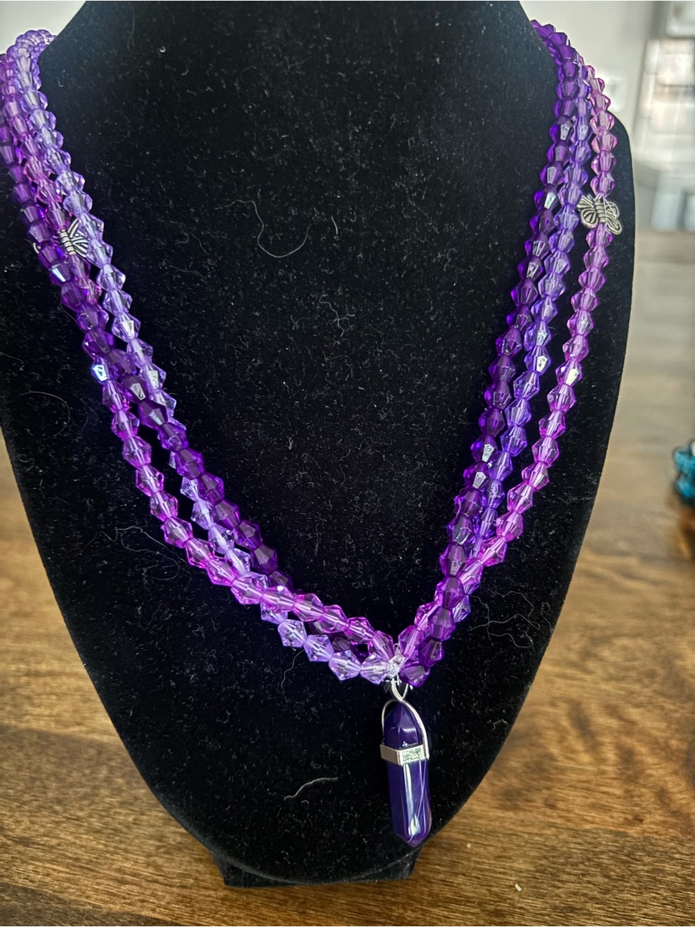 Layered Purple Beaded Necklace with Crystal Point Pendant